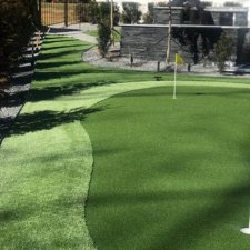 Premium backyard putting green installation with artificial turf